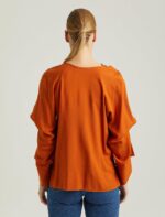 ⁦S22B357-BLUZ بلوز مع اكمام مفتوحة بأزرار لون اورنج⁩ - الصورة ⁦5⁩