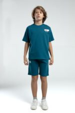 ⁦36225JW KAPPA BRAND تريننج شورت للاولاد قطن قطعتين لون تركواز⁩ - الصورة ⁦5⁩