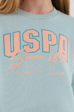 ⁦US2315 US POLO ASSN  طقم للفتيات قطن مبطن ودافئ بلوز لون فستقي مع  بنطال لون برتقالي⁩ - الصورة ⁦6⁩